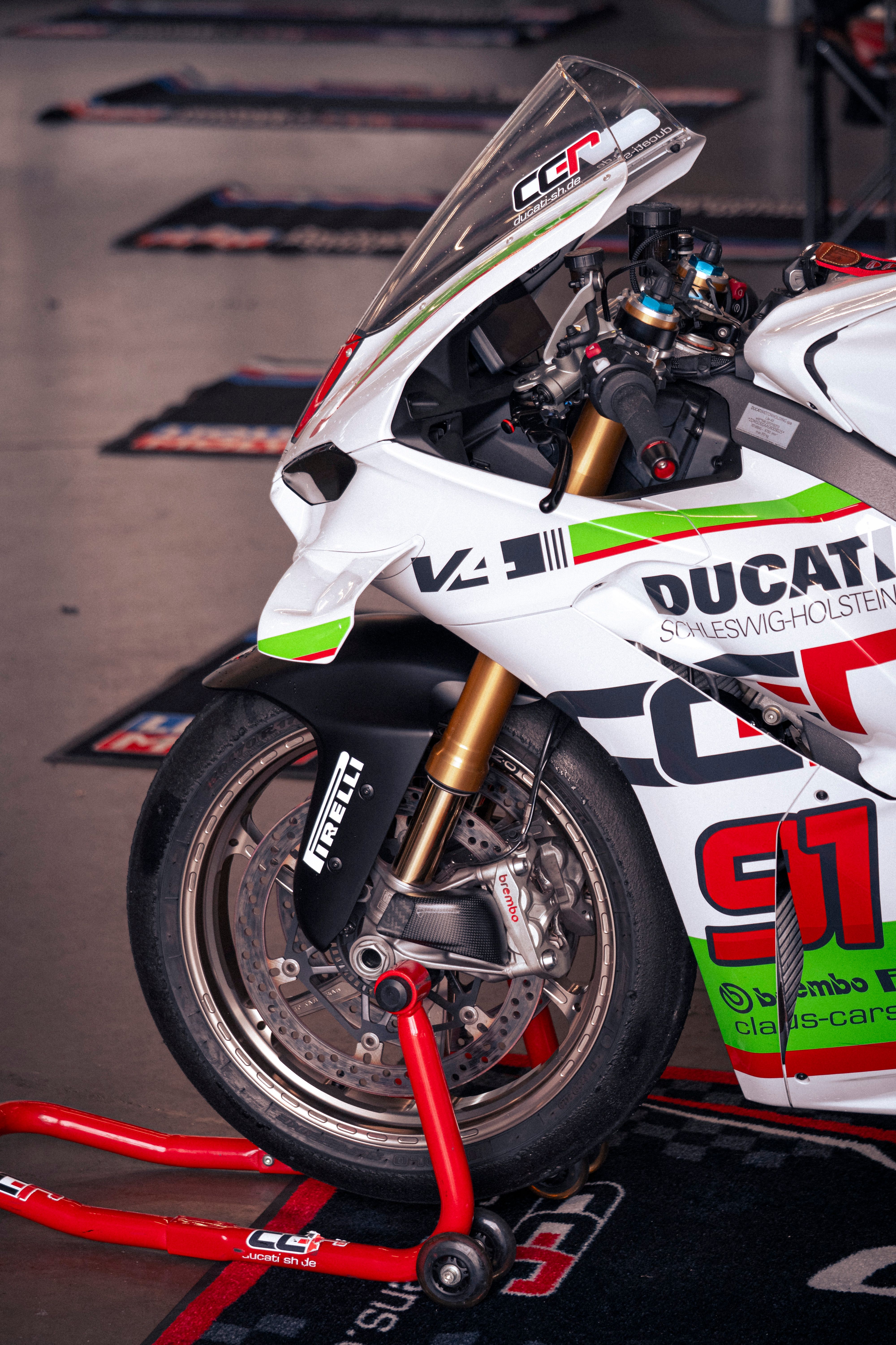Close-up of racing vinyl detail on a motorcycle fairing