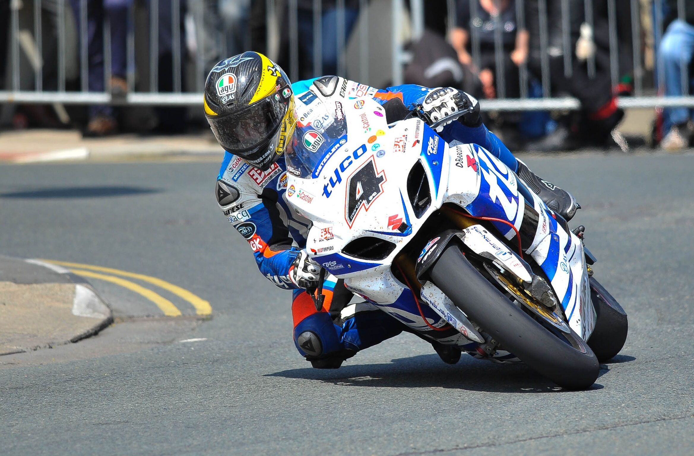 Race motorcycle staged before an event, ready for fast-turnaround race graphics