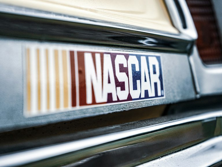 Close-up of race car sponsor decal and vinyl graphics Daytona Beach