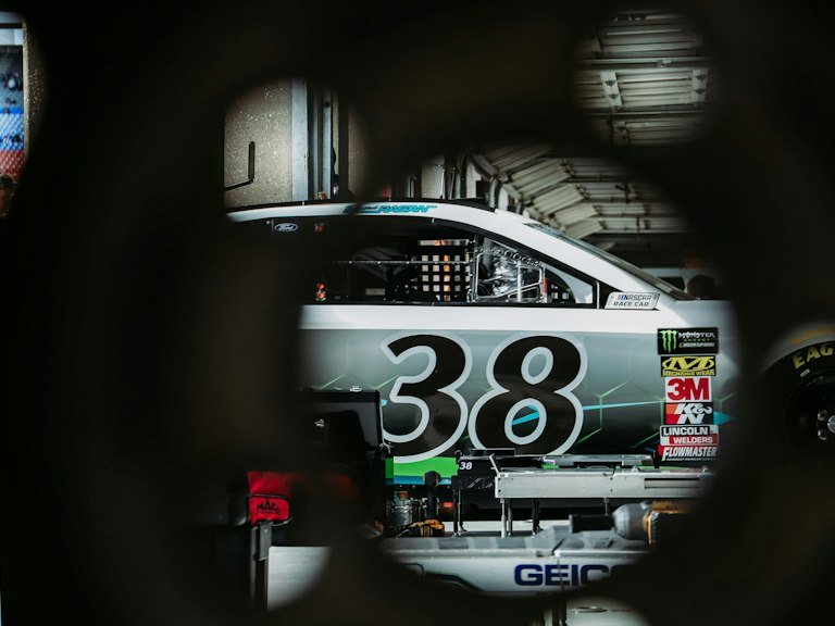 White and black race truck graphics in tunnel section