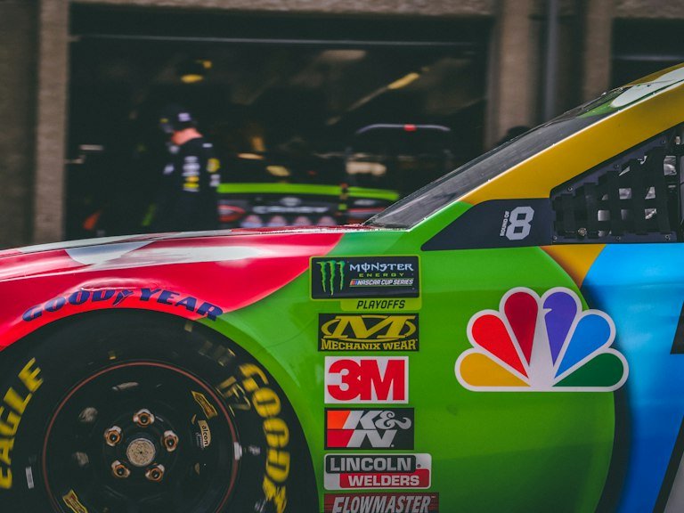 Red and green custom racing graphics stock car vinyl wrap