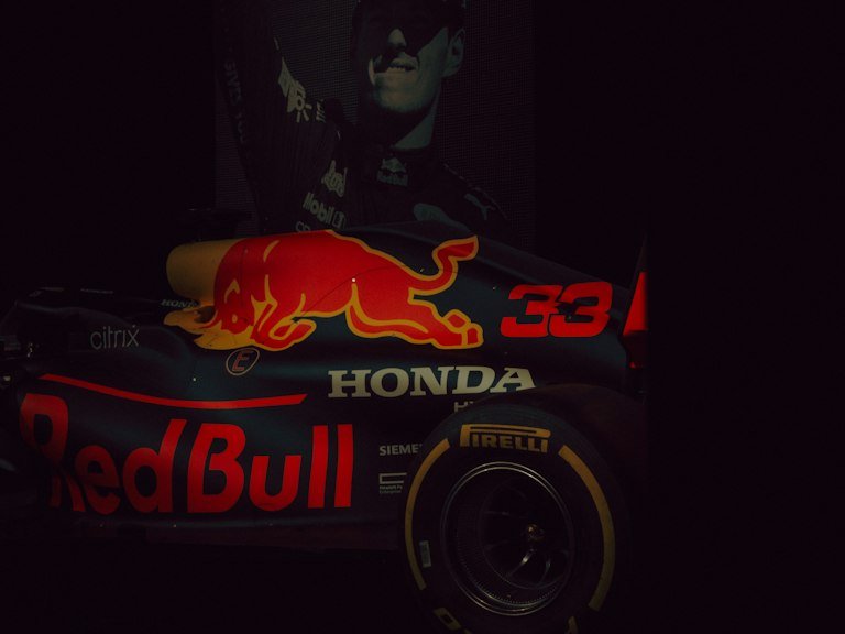 Driver name lettering vinyl graphic on a race car door panel